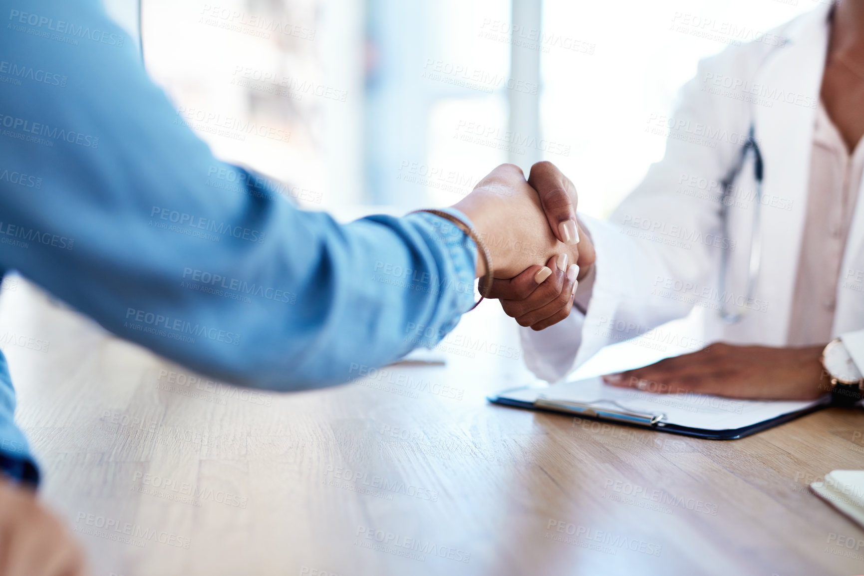 Buy stock photo Patient, doctor and meeting with handshake for agreement, appointment or checkup on medical aid at office. Closeup of person shaking hands with healthcare employee for health insurance or thank you