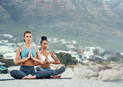 Buy stock photo Fitness, meditation and yoga with women on beach for mental health, peace or wellness in morning. Exercise, training and zen with friends on space at coast by ocean or sea for balance and mindset