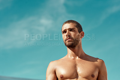 Buy stock photo Cropped shot of a man standing shirtless while out exercising