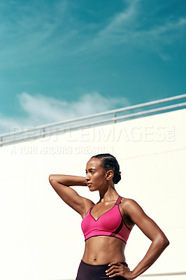 Buy stock photo Sports, fitness and sky, woman with mockup, wall at outdoor gym for health and wellness with muscle power. Workout, exercise and athlete with focus, space and healthy mindset for fit summer goals.