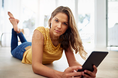 Buy stock photo House, portrait and girl on floor with tablet, streaming subscription, choose movies and films. Apartment, female person and digital for website, connection and chatting on social media in home