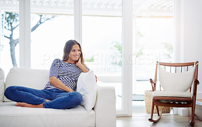 Buy stock photo Woman, thinking and chill in home on sofa to relax in house for comfort in living room for satisfaction. Ideas, weekend plan and confident person in apartment on resting break for wellness in Spain