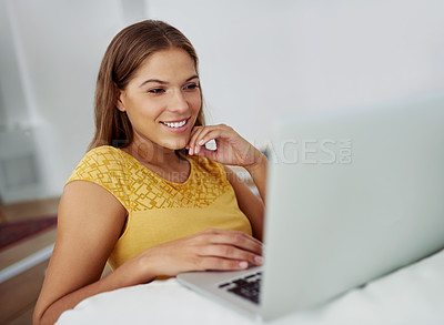 Buy stock photo Download, reading or happy woman on laptop in home for online news, research or social media article. Ebook, blog subscription or girl typing on technology for streaming choice on website to relax