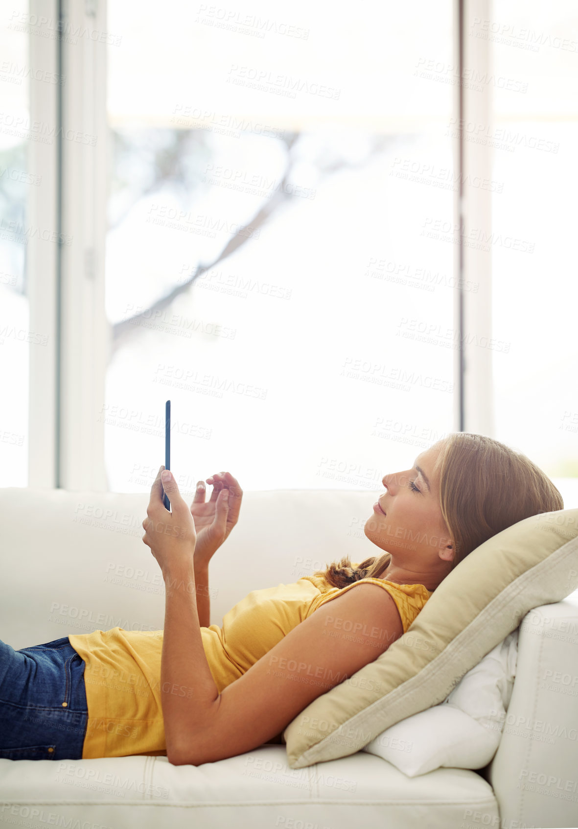 Buy stock photo Sofa, woman and relax with tablet for scroll, website information and sign in for subscription. Home, female person and reading with digital for streaming, download application and ebook on couch