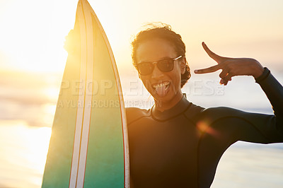 Buy stock photo Portrait of a beautiful young female surfer posing with her surfboard at the beach