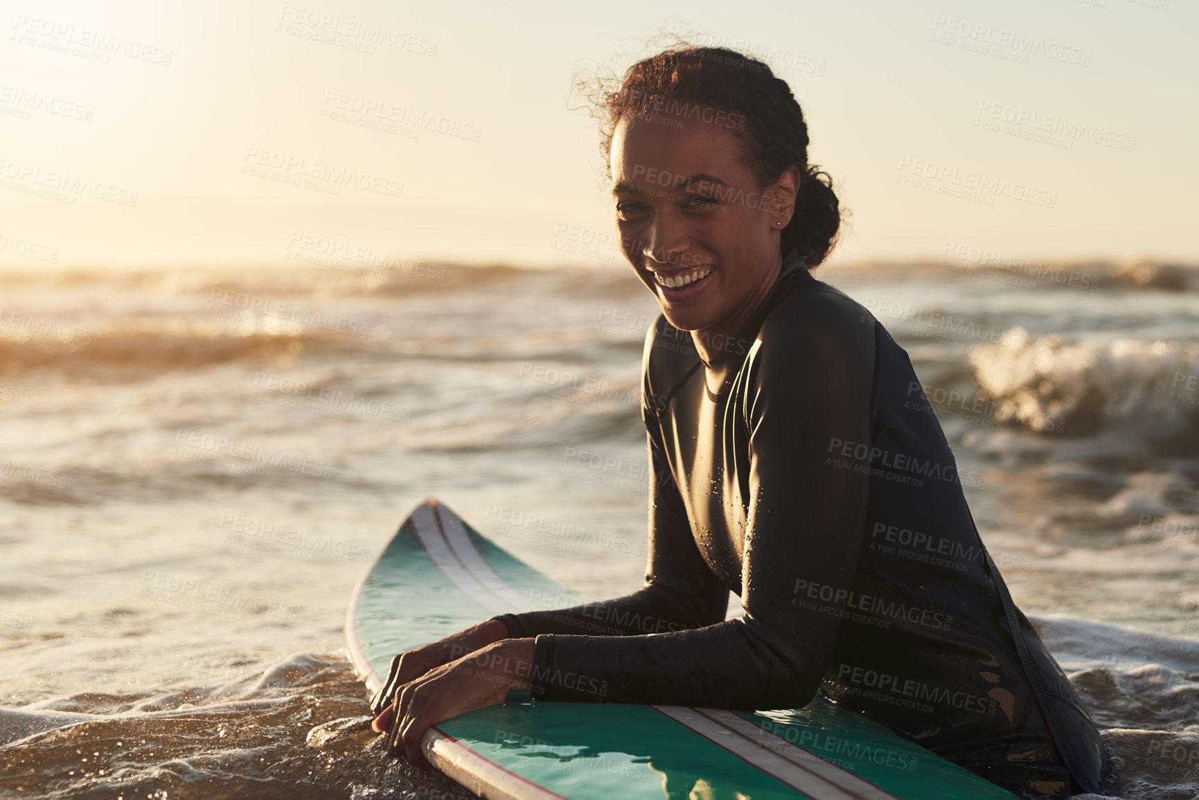 Buy stock photo Portrait of a beautiful young woman surfing in the coean