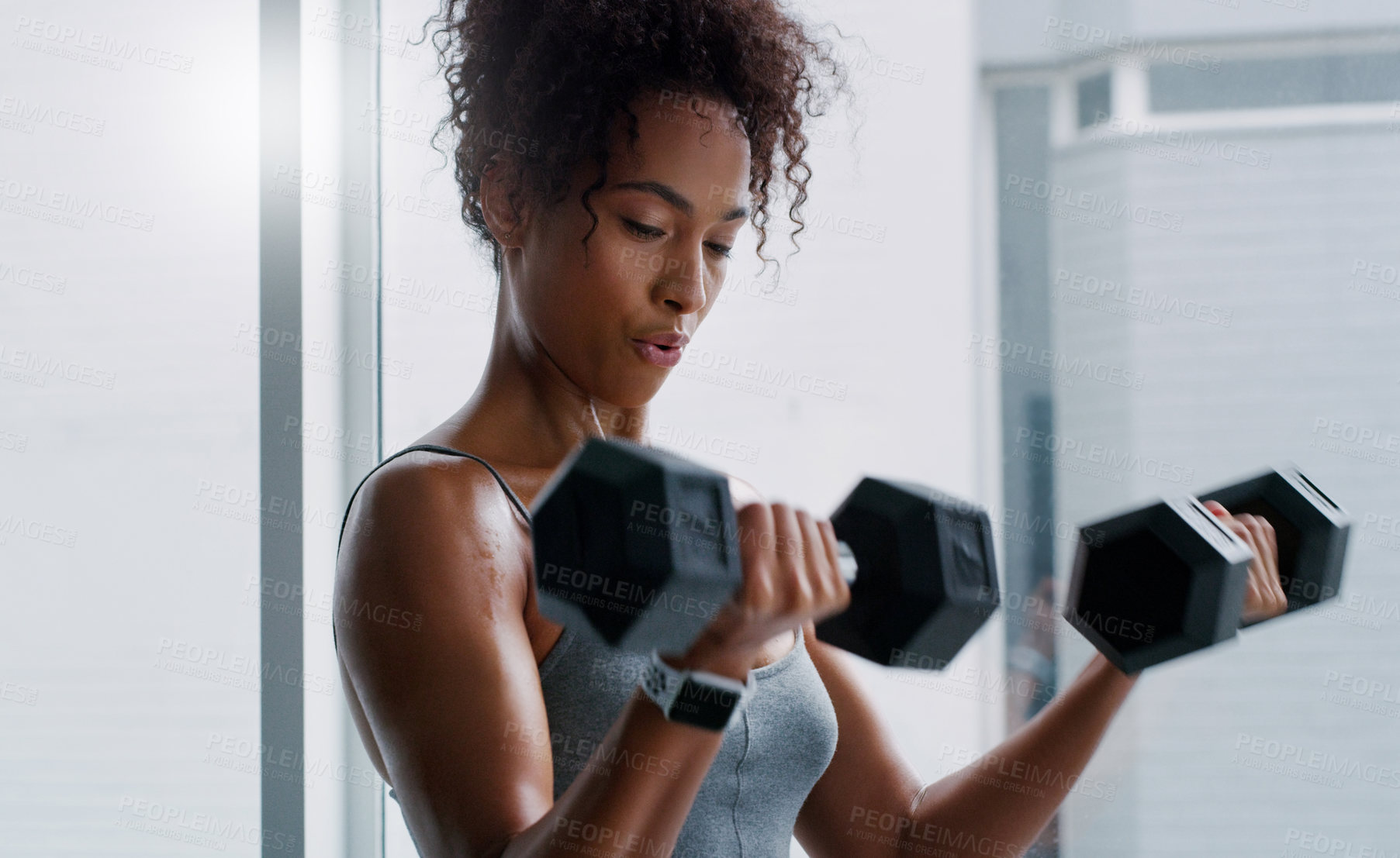 Buy stock photo African woman, dumbbells and exercise at gym with breathing for workout, wellness and muscle development. Person, bodybuilder and weightlifting for change, fitness or body transformation with health
