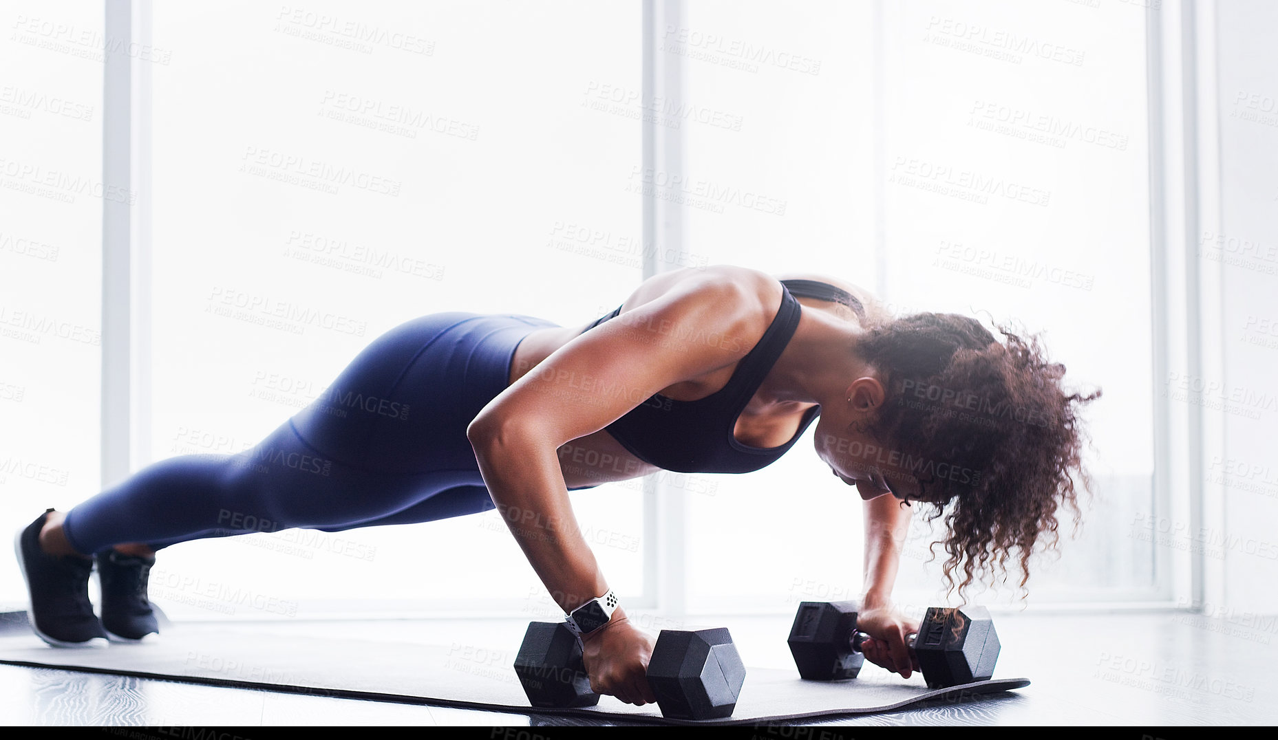 Buy stock photo Woman, weights and push ups in gym with fitness for core strength, muscle growth and endurance on floor. Athlete, person and plank exercise with dumbbells for healthy body, strong biceps and power