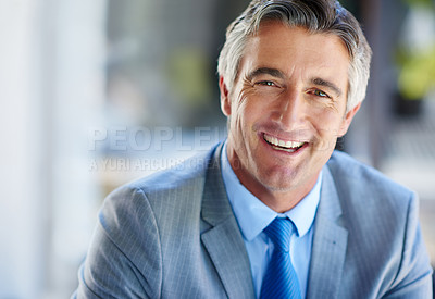 Buy stock photo Cropped portrait of a handsome mature businessman working outdoors