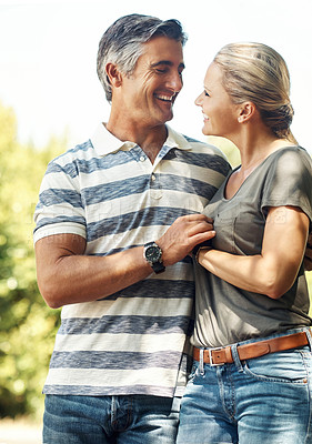 Buy stock photo Happy, laughing and couple in park walking for bonding, relationship and love outdoors in morning. Nature, marriage and man and woman in street for romance, affection and relax on weekend together