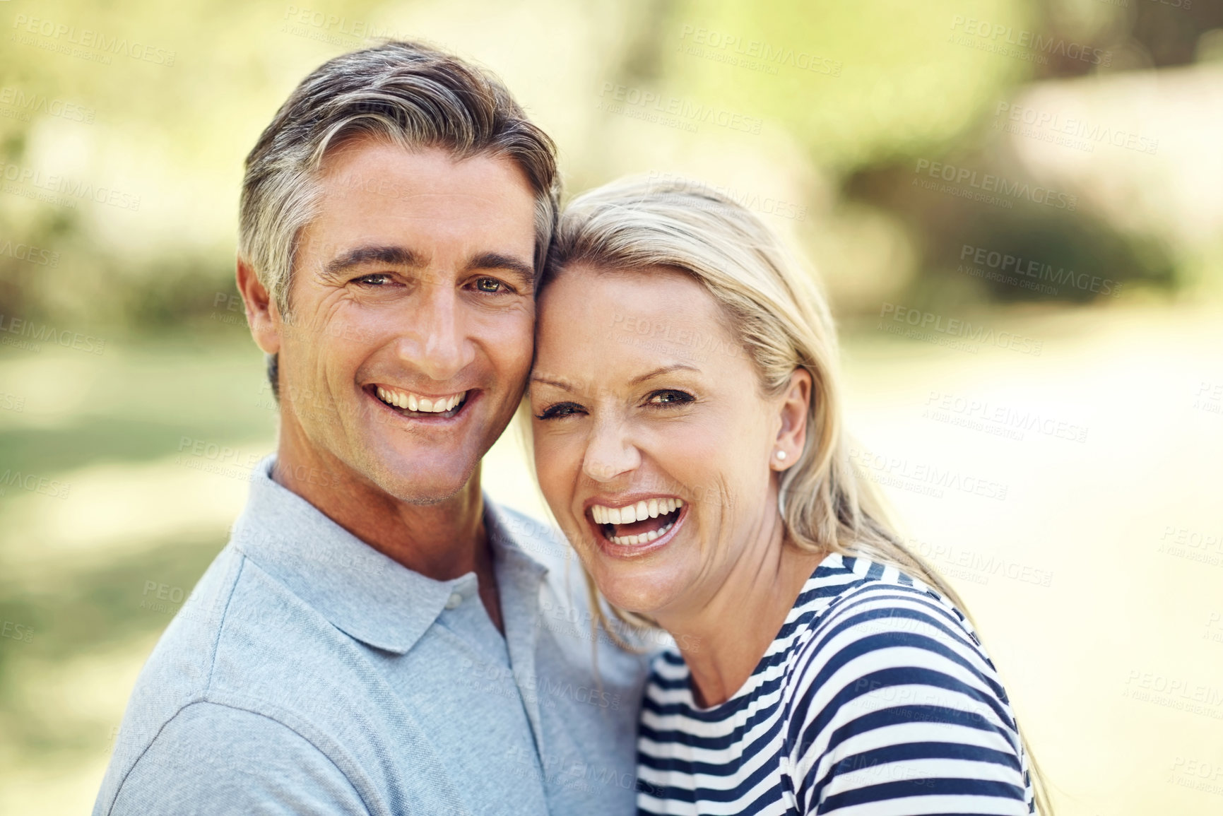 Buy stock photo Happy, portrait and mature couple in nature at park for bonding, marriage and connection in morning. Outdoor, hug and man and woman from Australia embracing in garden for romance on date with love.