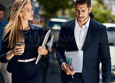 Buy stock photo Coffee, commute and documents with business people in city for travel to work together in morning. Data, laptop and walking with colleagues outdoor in urban town for collaboration or discussion