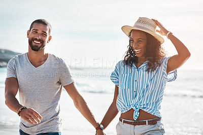 Buy stock photo Love, walk and holding hands with couple, beach and happy relationship for anniversary on holiday together. Romance, African man and woman with ocean, laugh and bonding with sunset on vacation