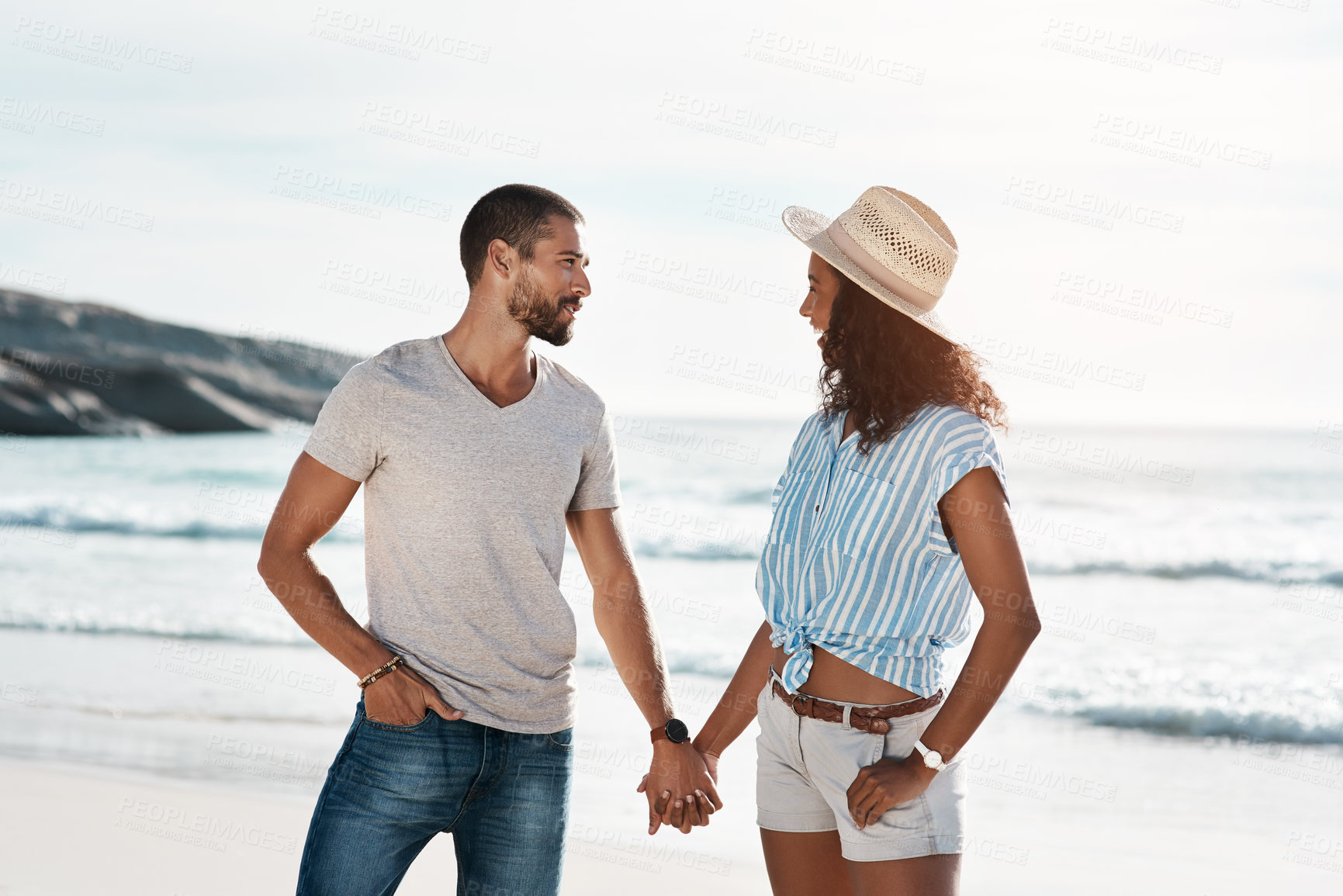 Buy stock photo Love, affection and holding hands with couple, beach and happy relationship for anniversary on holiday together. Romance, man and woman with ocean, break and bonding with Miami summer on vacation