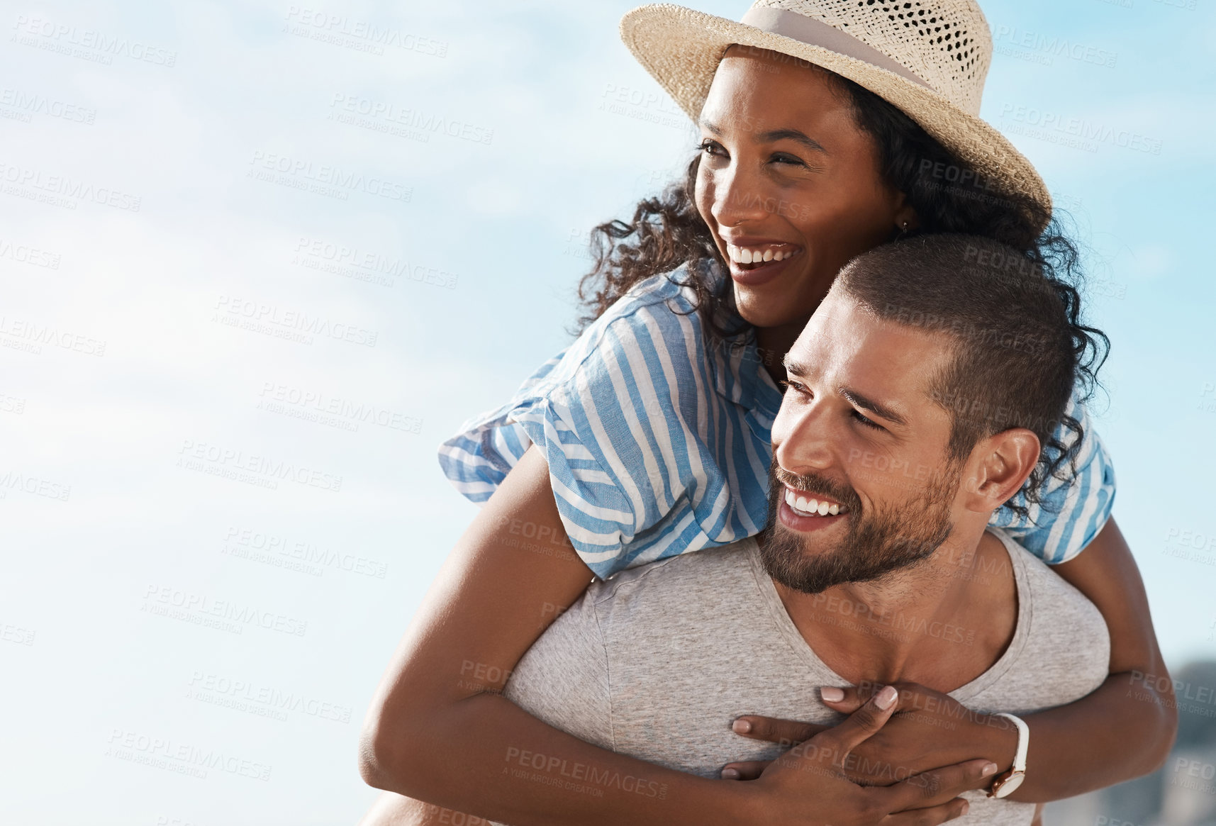 Buy stock photo Love, relationship and piggyback with interracial couple, beach view and people for anniversary on holiday together. Romance, man and woman with ocean, summer mockup and relax with sunset on vacation