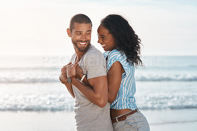 Buy stock photo Love, couple or happy at ocean with hug, travel or support in relationship. Man, woman or affection on beach for summer vacation, holiday or commitment with milestone or engagement in California