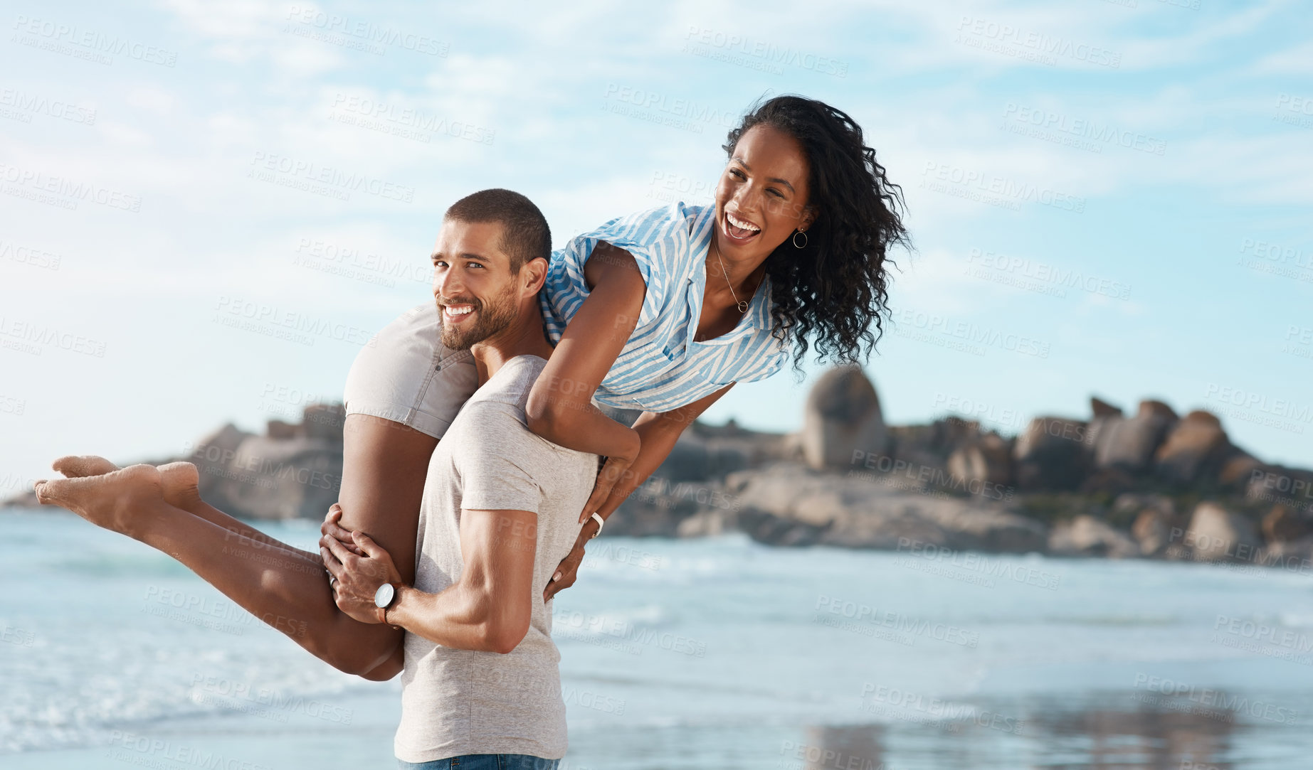 Buy stock photo Couple, portrait and honeymoon at beach for travel, summer and tropical holiday together in San Diego. Man, woman and carrying on sand by ocean for adventure, love and relax on vacation with partner