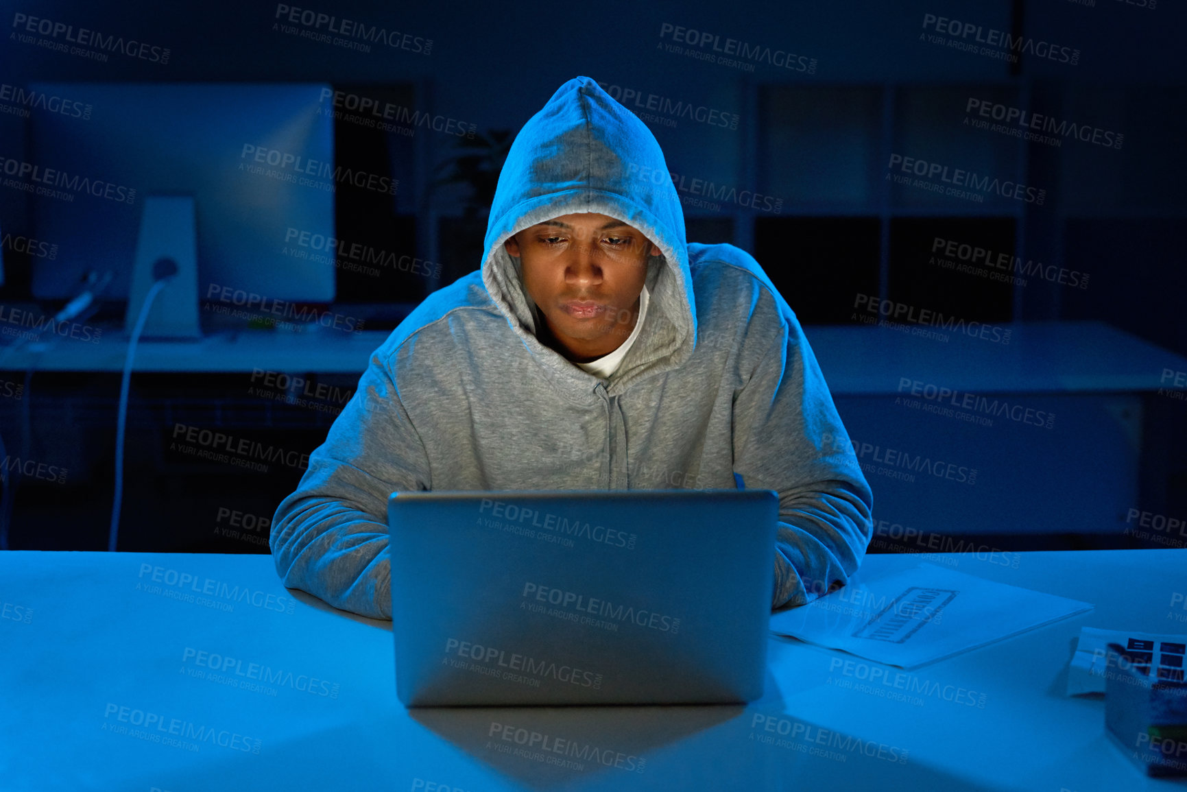 Buy stock photo Black man, night or hacker with laptop for cybersecurity problem, malware or phishing for crime. Programmer, hoodie and software update on technology with dark hacking expert writing algorithm system