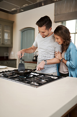 Buy stock photo Love, breakfast and cooking with couple in kitchen and hugging for food, morning and happiness. Smile, care and nutrition with man and woman eating at home for happy, health and hungry together