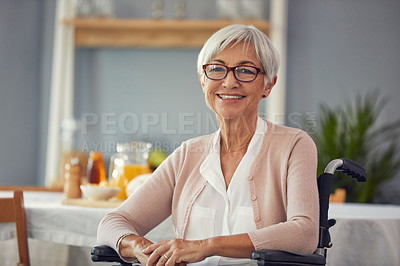 Buy stock photo Cropped portrait of a happy senior woman smiling while sitting in her wheelchair in a retirement home