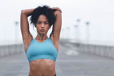 Buy stock photo Woman, portrait and stretching arm for fitness or warm up before morning workout routine, wellness and cardio. Female athlete, serious and outdoor for activity exercises for running training