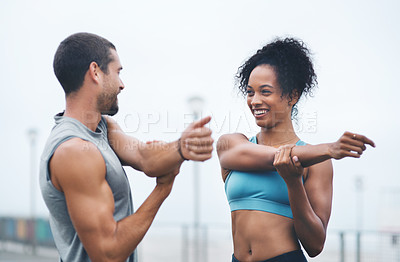 Buy stock photo Couple, outdoor and stretching arms for jog, runners and training on promenade for fitness. People, support and flexibility for muscle or athletes for wellness, exercise and workout preparation