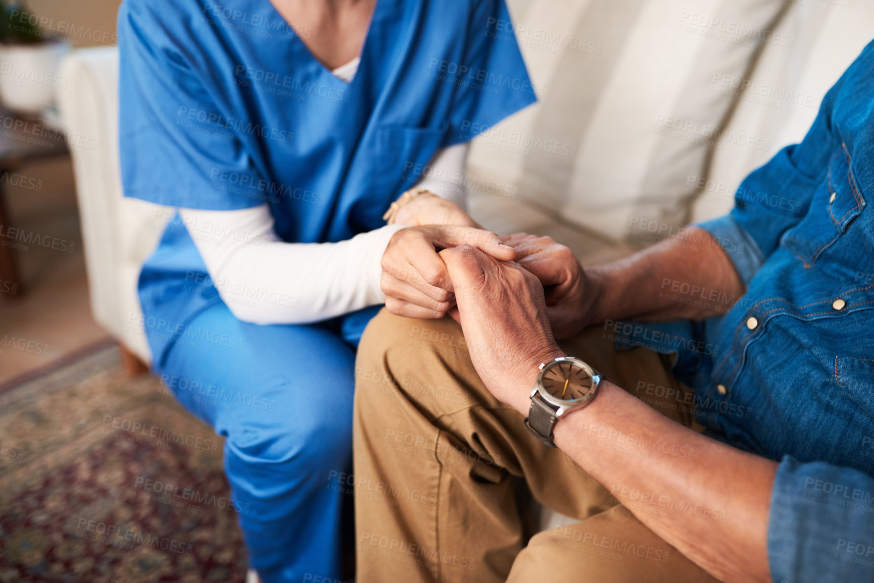 Buy stock photo Cropped shot of a female nurse hold her senior patient's hand
