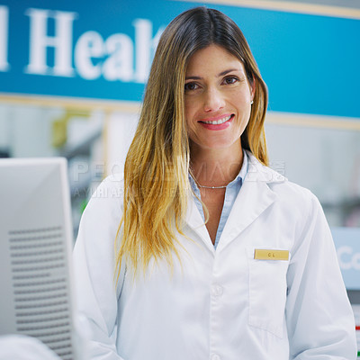Buy stock photo Cropped shot of a female pharmacist working in a chemist