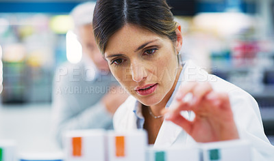 Buy stock photo Pharmacy customer, store shelf and woman help client with clinic pills, medicine product or prescription drugs. Retail stock check, healthcare and female pharmacist search for pharmaceutical box 