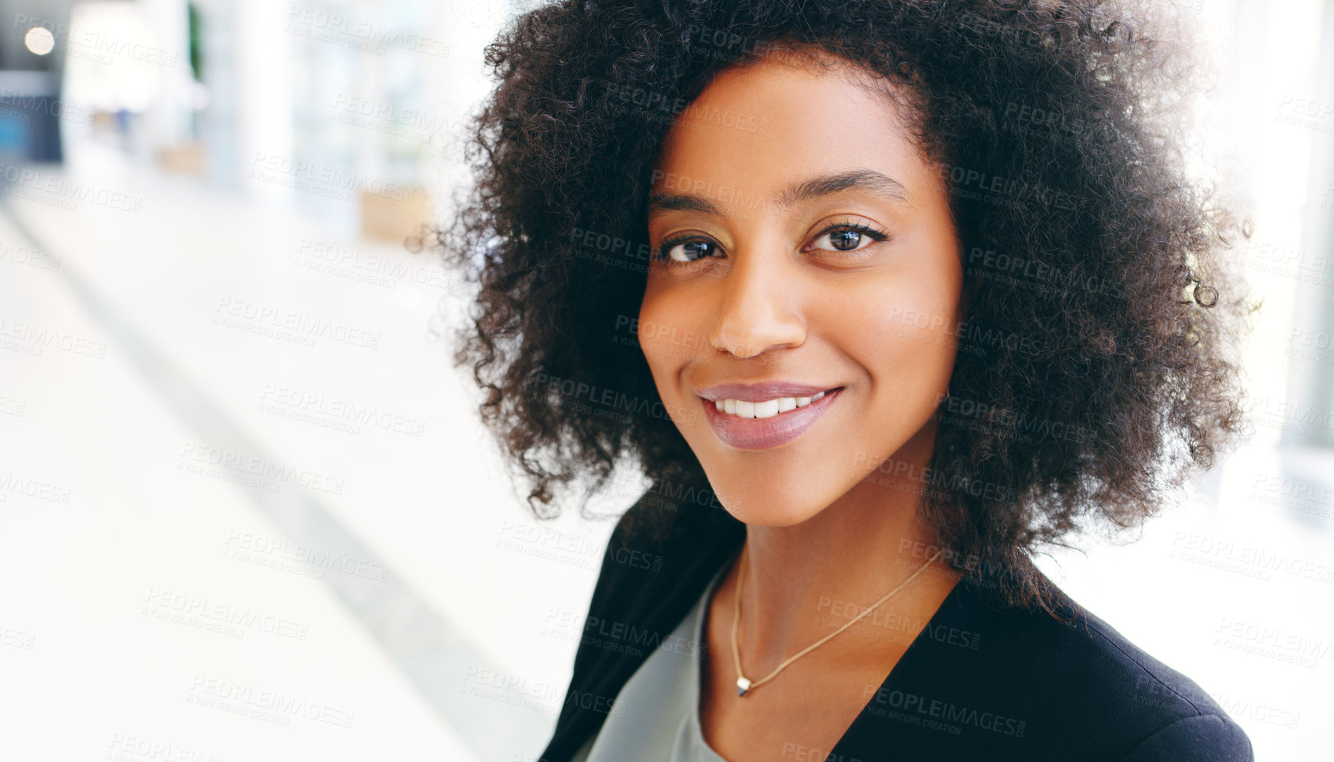 Buy stock photo Portrait of a confident young businesswoman working in a modern office