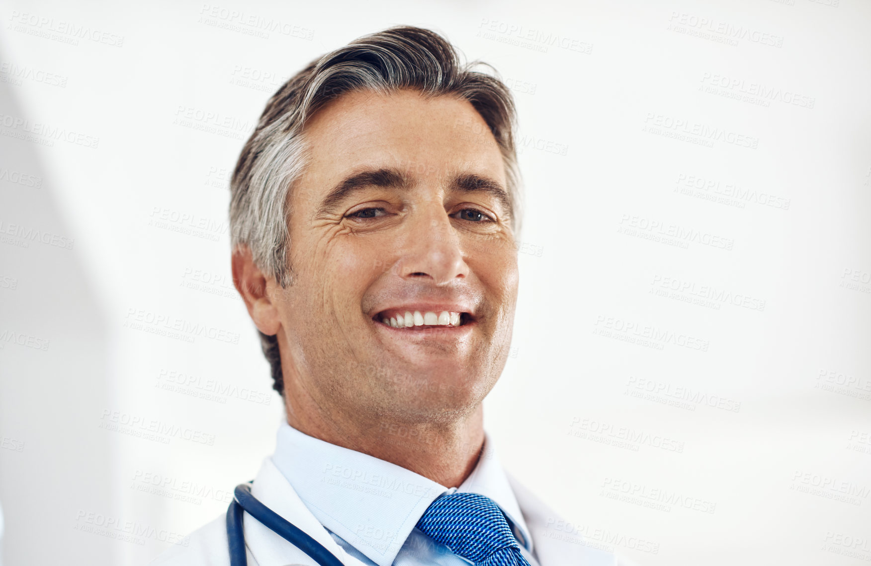 Buy stock photo Healthcare, doctor and portrait of man on a white background for medical service, career and consulting. Professional, hospital and person with stethoscope for cardiology, medicine and wellness