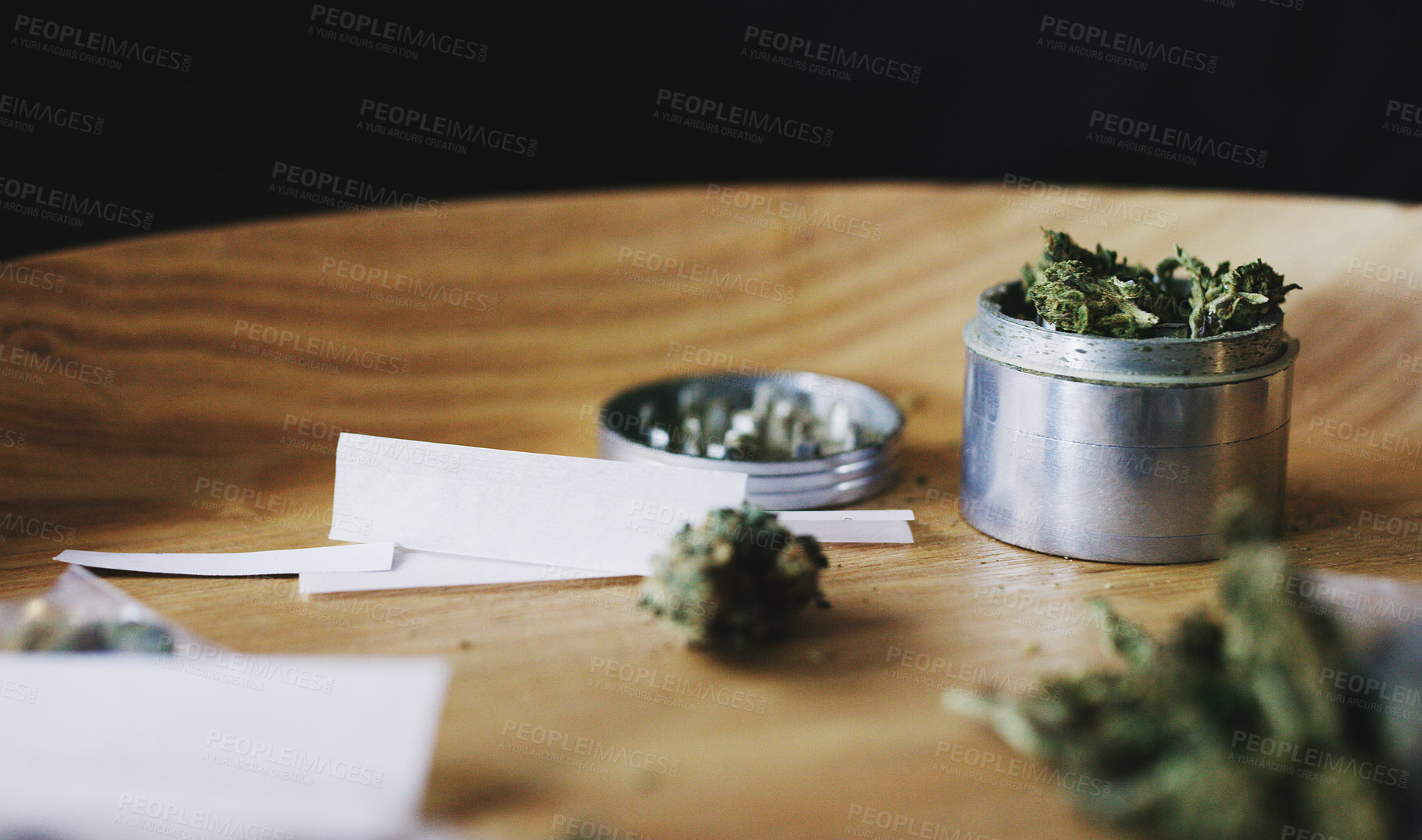Buy stock photo Shot of dried marijuana in a tin and paper