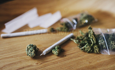 Buy stock photo Shot of dried marijuana and a rolled joint