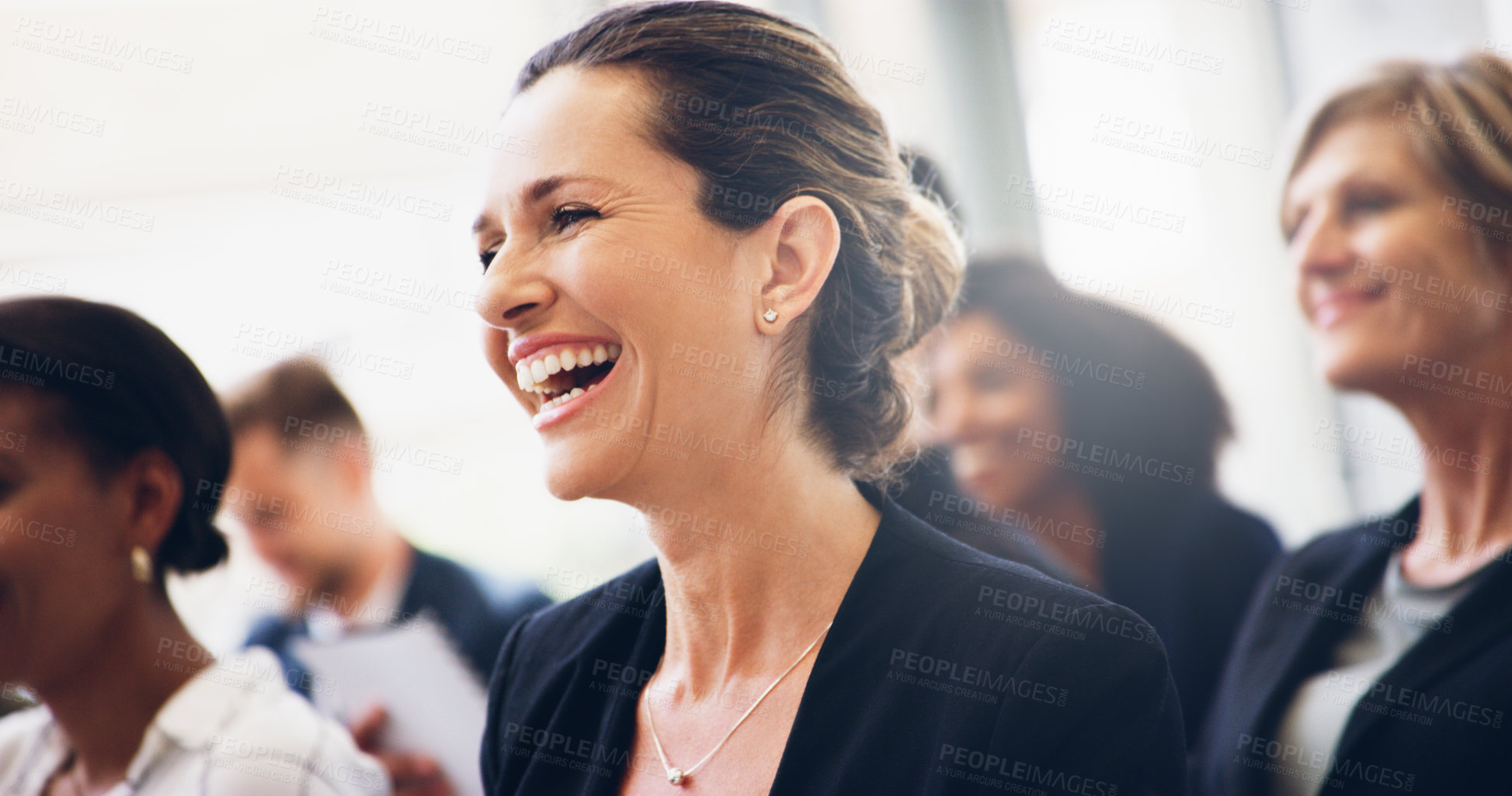 Buy stock photo Cropped shot of a mature businesswoman sitting and smiling while in the office during the day