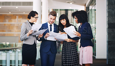 Buy stock photo Business people team reading paperwork, documents and planning strategy, financial information or company analytics in modern office. Diversity, corporate workers and paper reports, analysis and idea