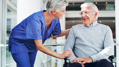 Buy stock photo Healthcare, nurse and retirement man in a rehabilitation nursing home for disability health. Wheelchair, clinic patient and caregiver smile with doctor and healthy medic care talking to senior male
