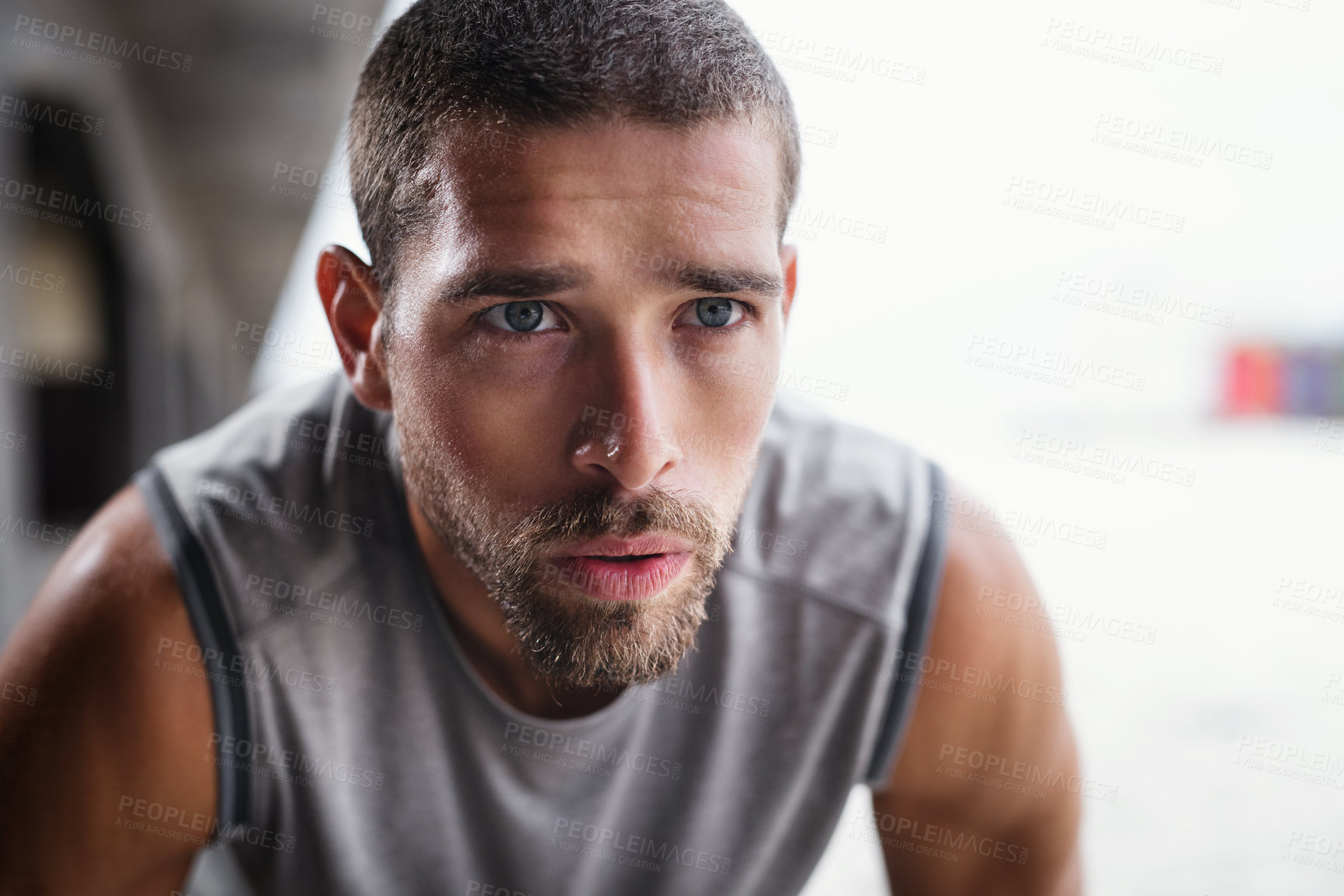 Buy stock photo Rest, breathing and runner man with fitness break outdoor from workout, sport and training. Tired, determination and wellness of athlete with closeup and exercise in the city with breathe recovery