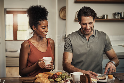 Buy stock photo Cropped shot of an affectionate young couple having breakfast in their kitchen at home