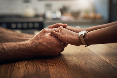 Buy stock photo Couple holding hands in love, support and care during difficult times, grief or sad loss. People hand touching together showing empathy, compassion and comfort after receiving bad news with a closeup
