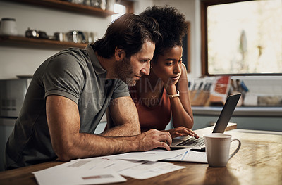 Buy stock photo Couple with a laptop doing finance paper work, paying debt insurance loans or online ebanking together at home. Two serious people planning and looking at financial document, bills rate for mortgage