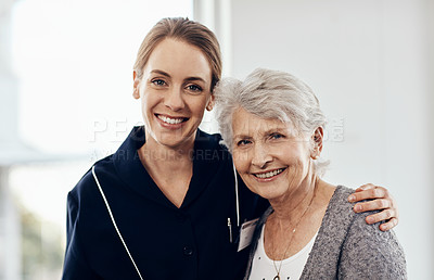 Buy stock photo Cropped shot of a female nurse caring for a senior woman