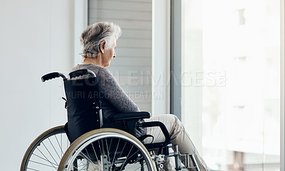 Buy stock photo Cropped shot of a senior woman looking thoughtful while sitting in her wheelchair