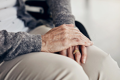 Buy stock photo Cropped shot of an elderly woman’s hands resting on her lap