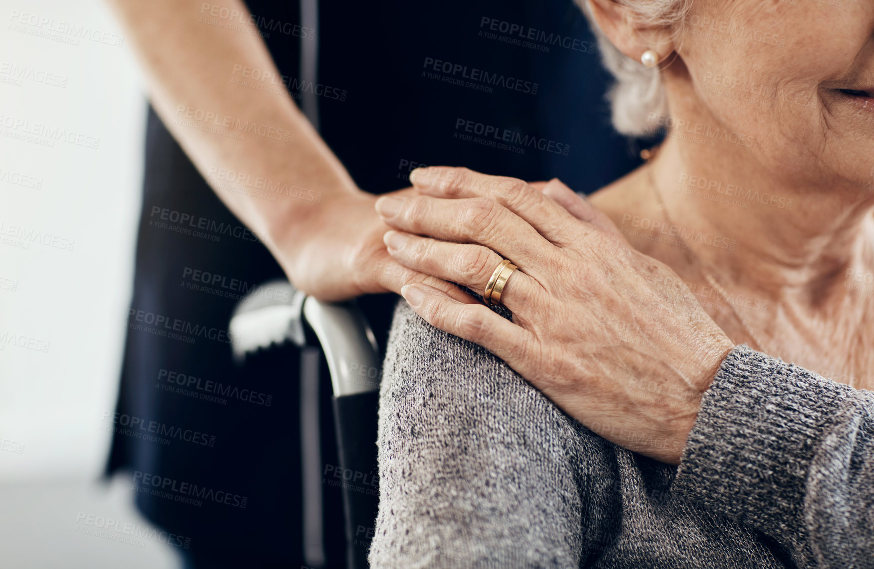 Buy stock photo Cropped shot of a female caregiver comforting a senior woman