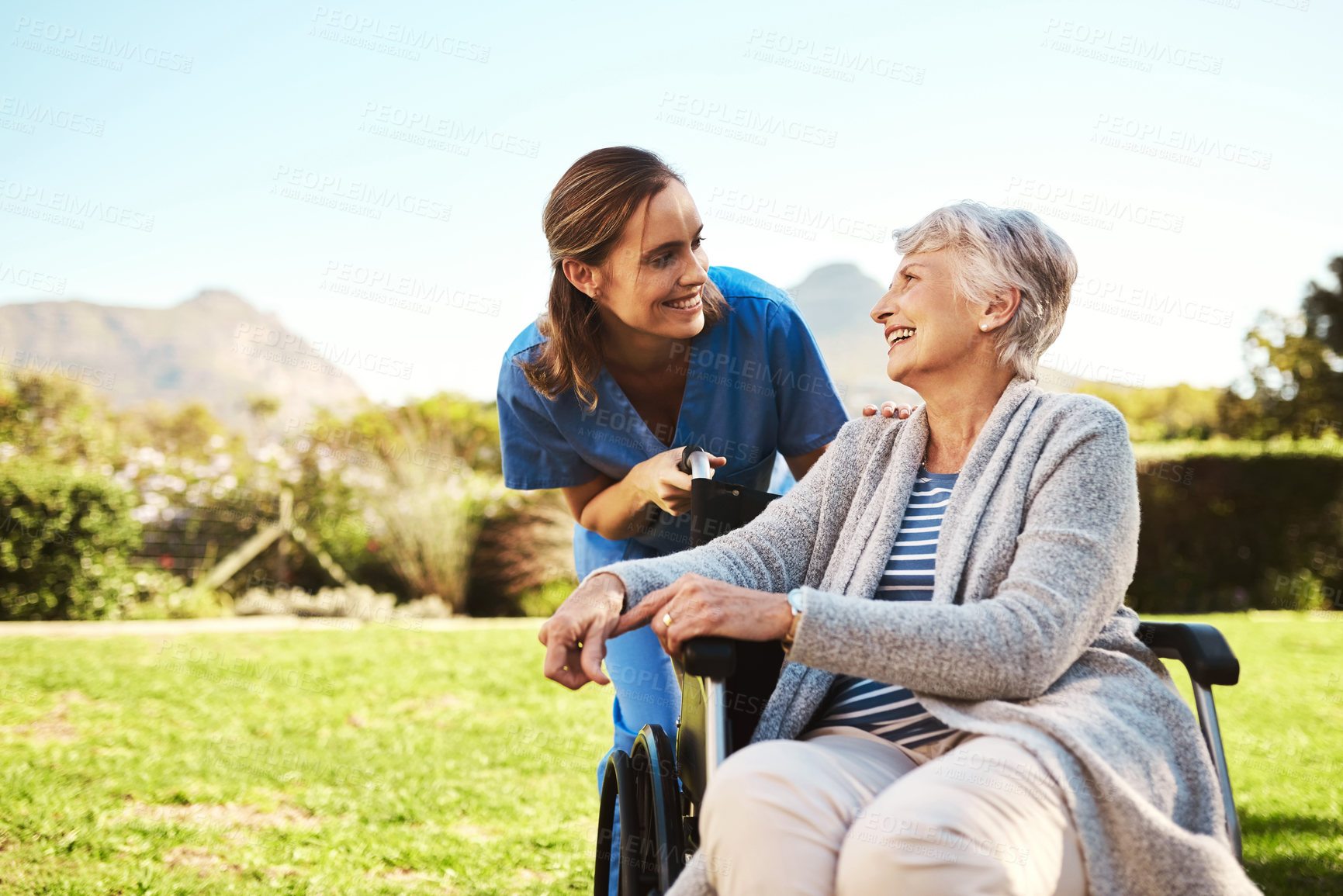 Buy stock photo Senior woman, nurse and wheelchair for healthcare support, life insurance or garden at nursing home. Happy elderly female and caregiver helping patient or person with a disability in nature outdoors