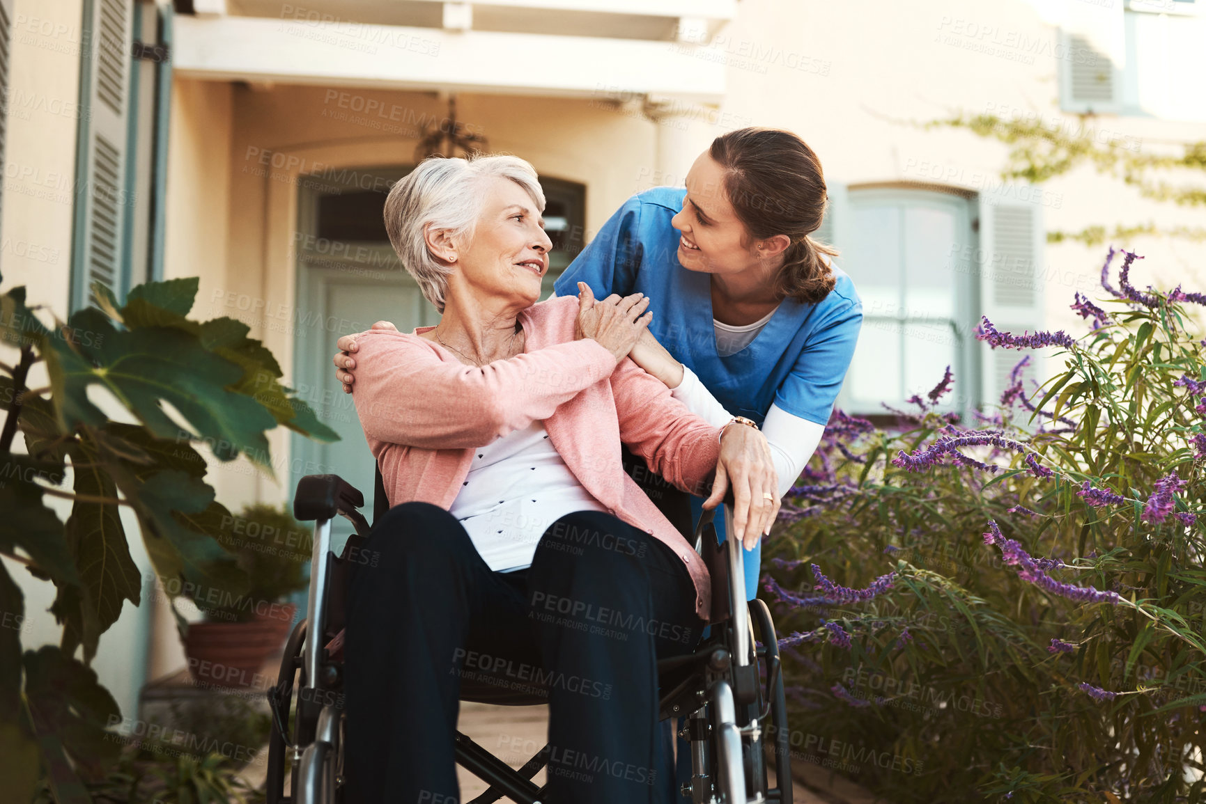 Buy stock photo Senior woman, wheelchair and nurse in healthcare support, talking or garden walk at nursing home. Happy elderly female and caregiver helping patient or person with a disability, health or retirement