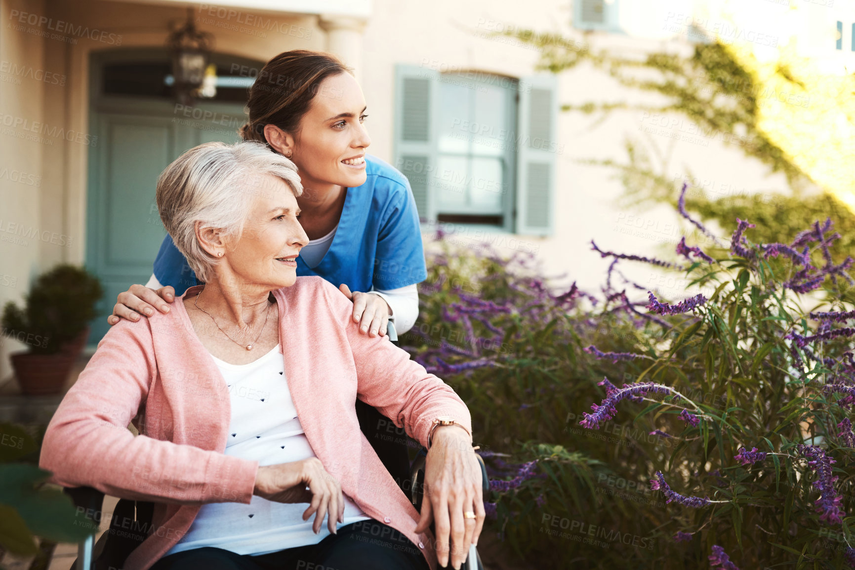 Buy stock photo Senior woman, wheelchair and nurse in elderly care, support or garden walk at nursing home. Happy mature female and caregiver helping patient or person with a disability for healthcare outdoors
