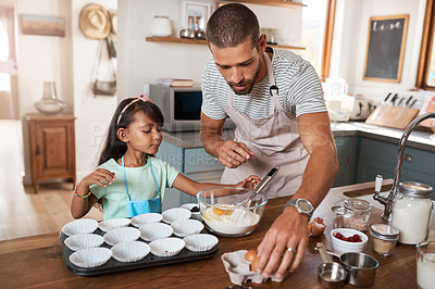 Buy stock photo Father, child and teaching with baking, eggs and cooking for nutrition in home for education. Male person, girl and learning for youth development, support and bonding on kitchen counter in family