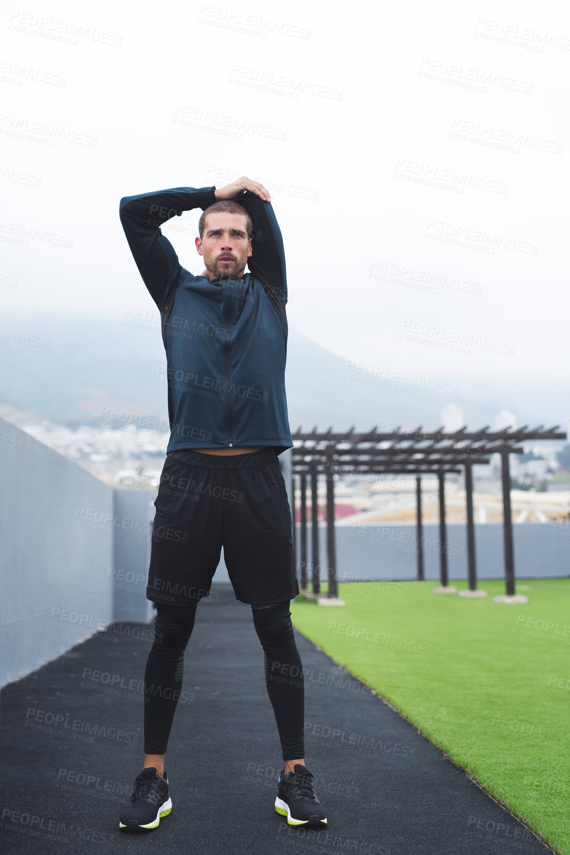 Buy stock photo Stretching, outdoor and man with fitness, calm and workout with endurance, challenge and balance. Breathing, person and athlete with morning routine, training and wellness with health and warm up