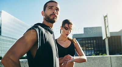 Buy stock photo Couple, thinking and training time for performance in city, exercise or workout for race competition. Healthy man and woman with rest in urban town, watch and cardio fitness for outdoors running
